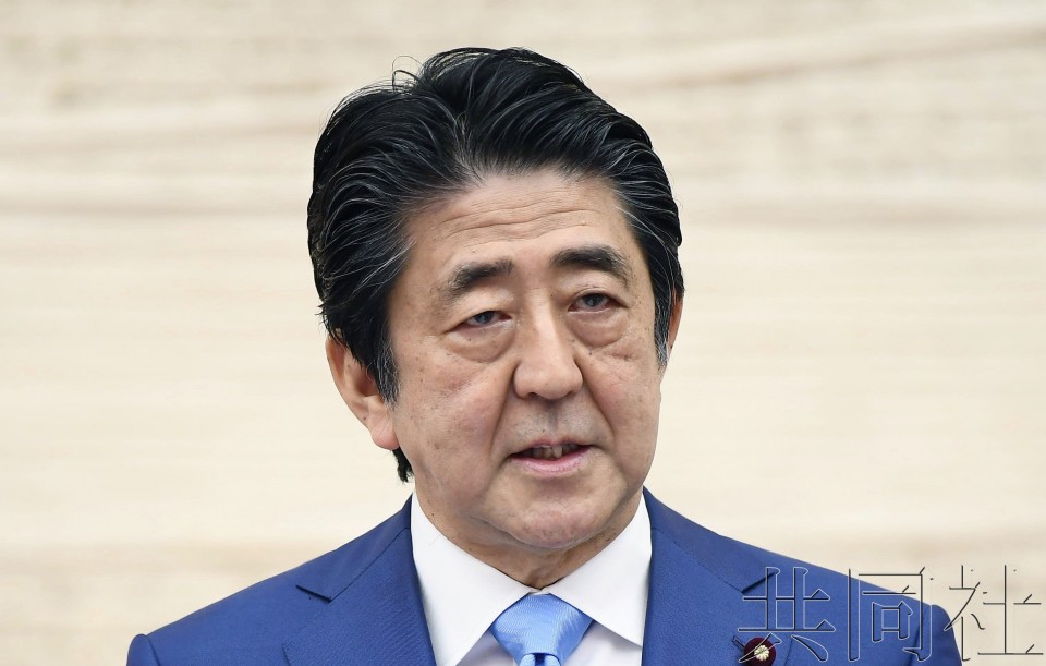 安倍称疫情下日本支援“世界第一”引质疑