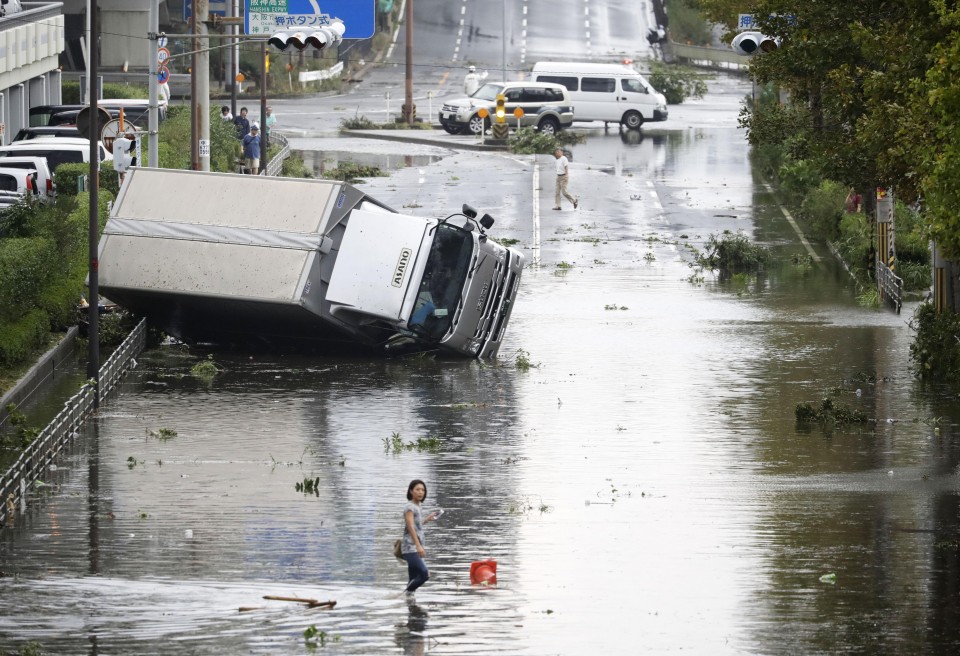 Powerful typhoon Trami batters Okinawa island, churns to Japan mainland