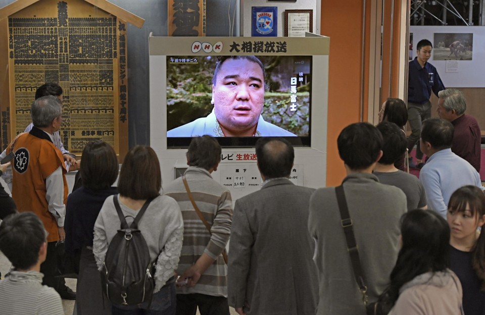 Sumo wrestling embroiled in scandal again after champion admits assault
