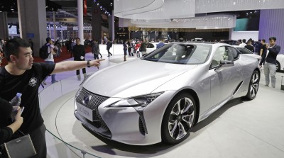 Toyota to lower luxury car prices in line with China tariff cut