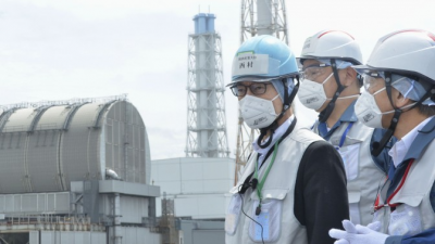 Japan's industry minister inspects crippled Fukushima nuclear plant