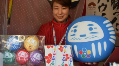Colorful "daruma" dolls at shrine popular among J-pop band Arashi's fans