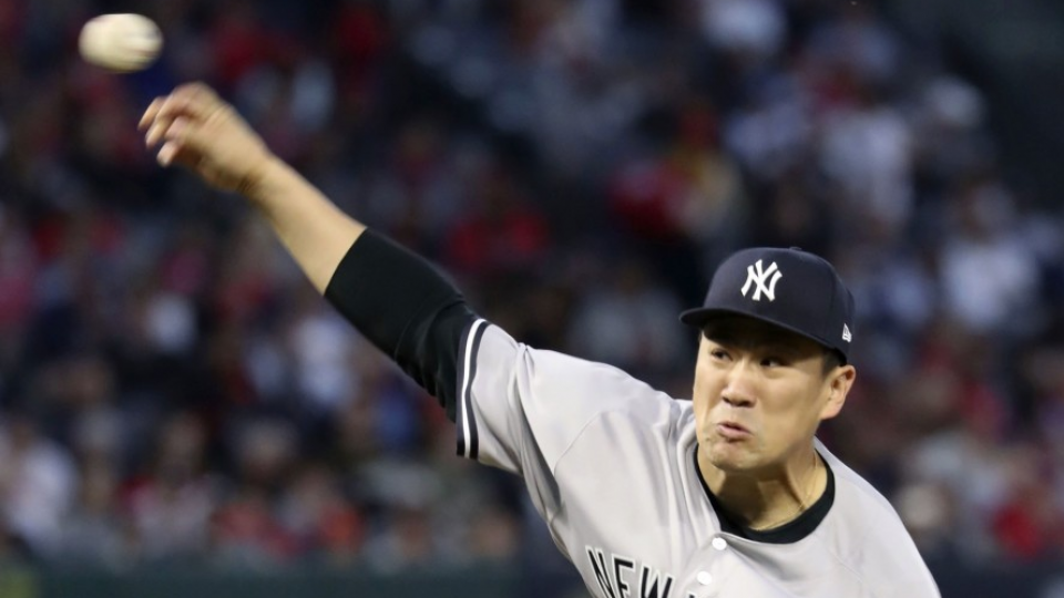 Yankees' Masahiro Tanaka reacts to Shohei Ohtani possibly joining