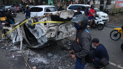 129 killed in crowd stampede during football match riot in Indonesia