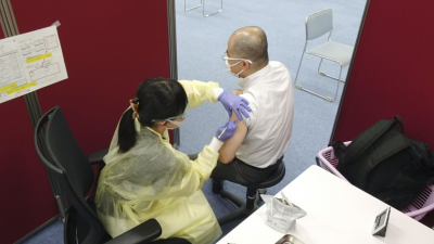 Japan speeds up COVID vaccinations, reaches 1 mil. daily shots target