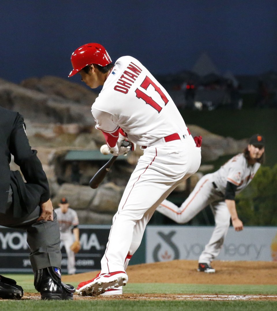 Holland serves up three home runs, Angels come back to sink Giants Holland serves up three home runs, Angels come back to sink Giants