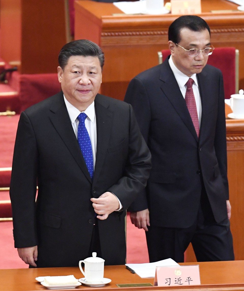 China defends scrapping of presidential term limit