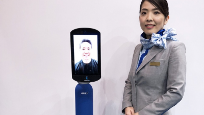 B. League basketball coach gives remote lesson with avatar robot