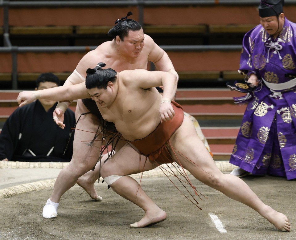 Rehabilitated sumo wrestler repays stablemaster with 1st