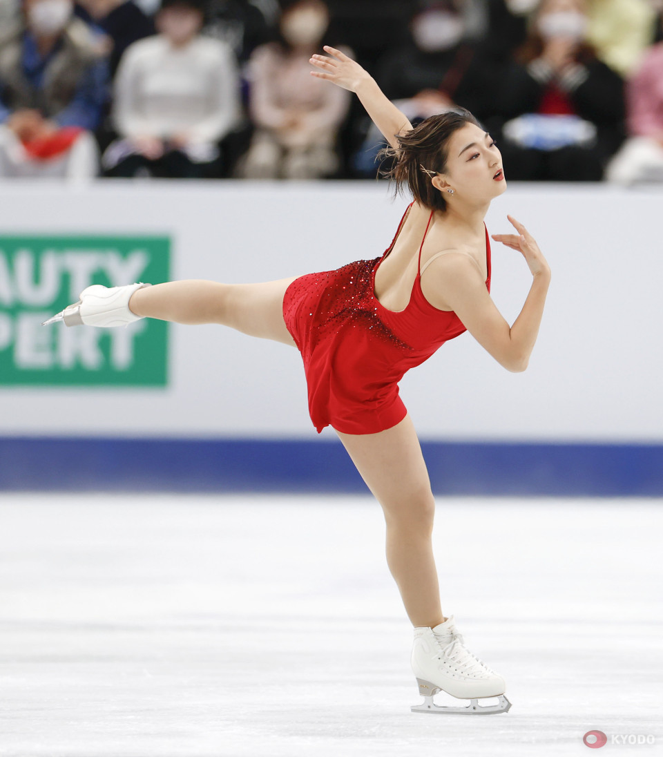 Japan's Sakamoto wins third straight figure skating women's world title