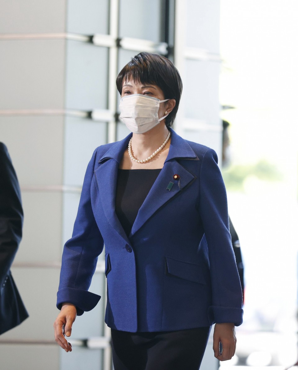 Japan's new cabinet reflects PM's focus on gender and defence