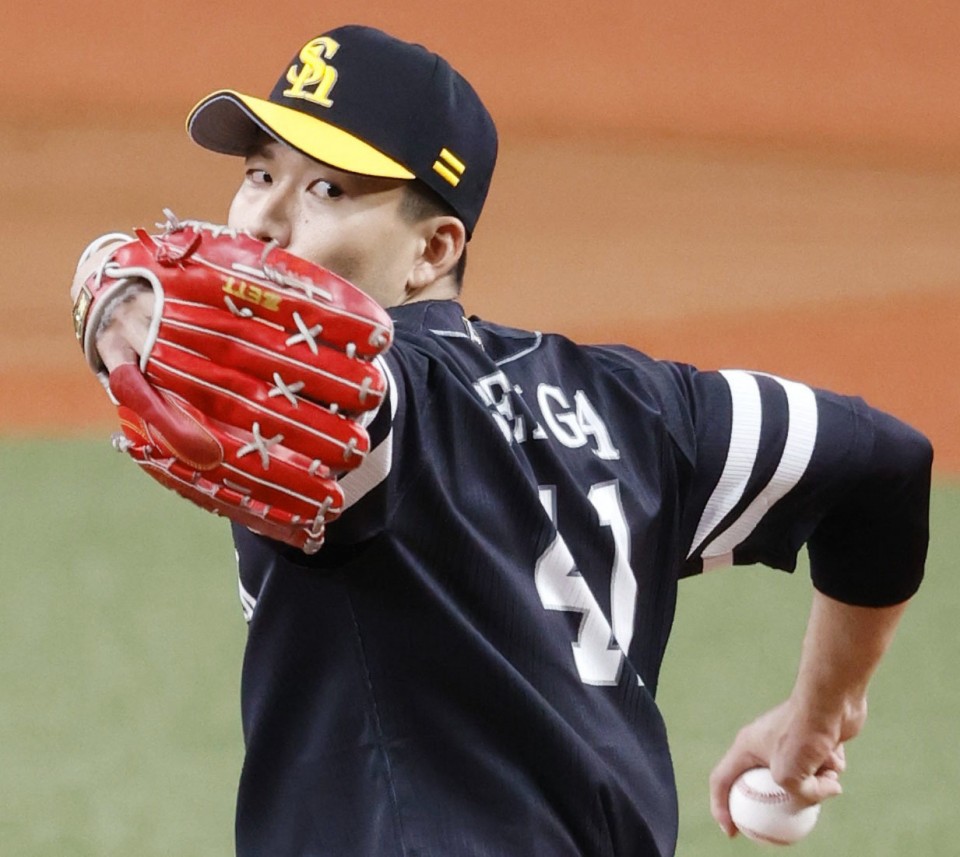 Kodai Senga of the SoftBank Hawks pitches in Game 1 of the Japan